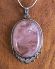 Rose Quartz Oval Pendant with Sterling Silver Round Spiral Ornaments